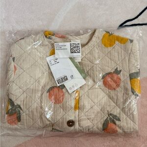 H&M Cream Quilted Jacket with Orange and Green Print